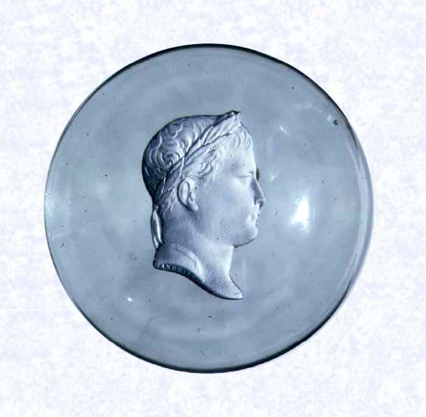 <B>Sulphide Portrait of Napoleon I<BR>France<BR>Clichy, circa 1830</B><BR>Diameter: 6.7 cm (2 5/8 inches)<BR>(702280)<BR><BR>Sulphide portrait of Napoleon I; taken from an 1809 medal &quotRome Reuní a la France" by Andreiu, whose name is inscribed along the base of the portrait