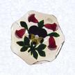 Lampworked Pansy and Gentian BouquetFranceBaccarat, circa 1845-55Diameter: 7.6 cm (3 inches)(702287)Lampworked flat bouquet of one purple and yellow pansy and four light scarlet gentians with green leaves and stems; star-cut base; sides cut with seven circular printies
