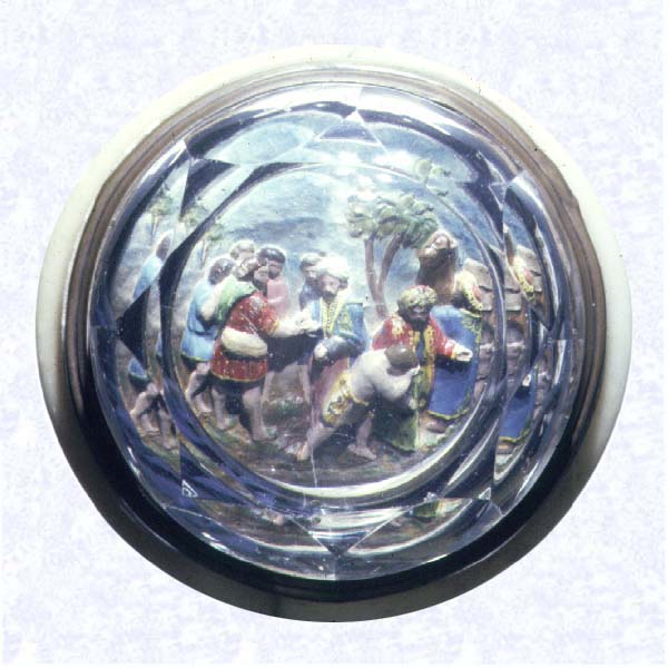 <B>Hand-painted Pinchbeck<BR>Europe<BR>factory unknown, circa 1845-55</B><BR>Diameter: 8.5 cm (3 5/16 inches)<BR>(702347)<BR><BR>Pinchbeck weight with alabaster base; gold alloy; hand-painted scene, &quotJoseph Sold into Slavery;" dome cut with triangular facets and five-sided printies