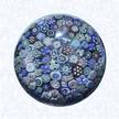 Miniature Close MillefioriFranceBaccarat (signed), dated 1847Diameter: 4.5 cm (1 3/4 inches)(702356)Miniature close millefiori weight, including one silhouette cane and one signed and dated cane inscribed &quotB/1847"
