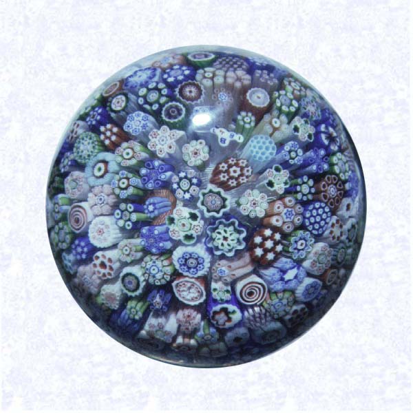 <B>Miniature Close Millefiori<BR>France<BR>Baccarat (signed), dated 1847</B><BR>Diameter: 4.5 cm (1 3/4 inches)<BR>(702356)<BR><BR>Miniature close millefiori weight, including one silhouette cane and one signed and dated cane inscribed &quotB/1847"