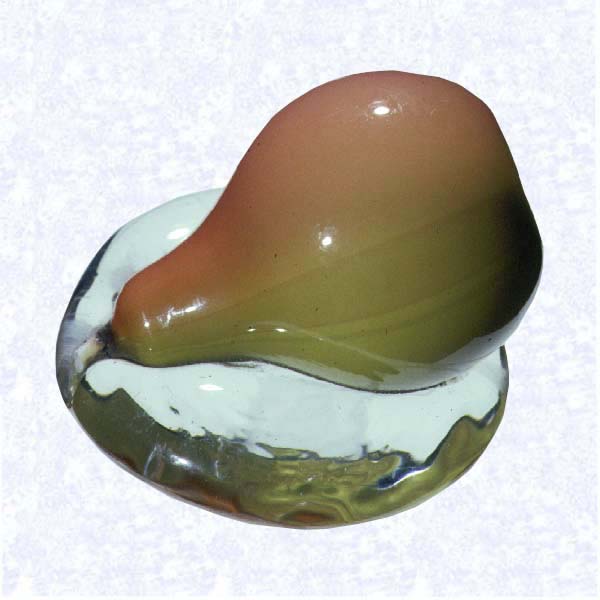 <B>Blown Glass Pear<BR>United States<BR>New England Glass Company<BR>Cambridge, Massachusetts, circa 1852-1880</B><BR>Diameter: 6.5 cm (2 1/2 inches) Height: 4.5 cm (1 3/4 inches)<BR>(702385)<BR><BR>Small blown glass pear shaded yellow to pink; fused to a circular clear glass base; green blossom
