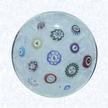 Spaced Millefiori on FiligreeFrance Baccarat, dated 1849Diameter: 6 cm (2 3/8 inches)(702388)Spaced millefiori canes, including six silhouette canes and one dated cane inscribed &quot1849" (&quot1849" reversed); on a white filigree ground
