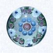 Miniature Pattern Millefiori with Clichy RosesFranceClichy, circa 1845-55Diameter: 4.5 cm (1 3/4 inches)(702357)Miniature pattern millefiori weight with concentric rings of millefiori canes in white, blue, and red, including ten pink Clichy roses in the outermost ring