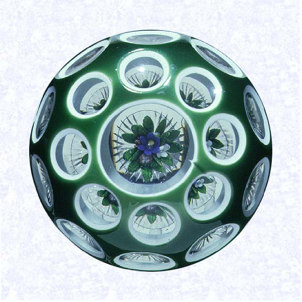 <B>Green Overlay<BR>France<BR>Saint Louis, circa 1845-55</B><BR>Diameter: 8 cm (3 1/8 inches)<BR>(702459)<BR><BR>Double overlay (opaque white overlaid with dark green), enclosing an upright bouquet; star-cut base; sides cut with three rows of circular printies in graduated sizes, one on top
