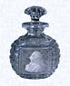 Sulphide Portrait on BottleEnglandApsley Pellatt (attributed) circa 1819-1840Width: 7.6 cm (3 inches) Height: 10.5 cm (4 1/8 inches)(702469)Cut-Glass bottle with stopper; sulphide profile portrait of George III set in panel on obverse side; diagonal cuts on reverse panel; deeply grooved, horizontal cuts on shoulders and side edges; mushroom-shaped stopper cut with deep radial facets
